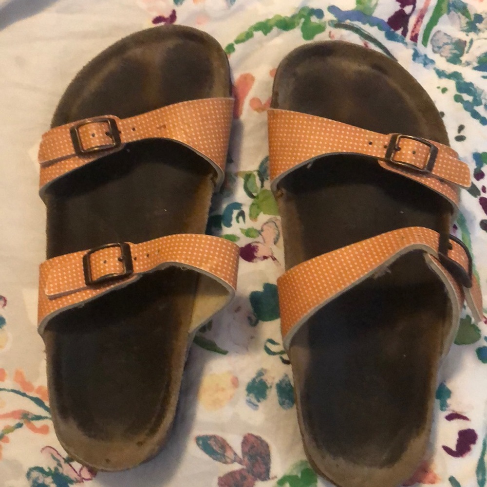 Birkenstock Burki’s sandals with orange straps